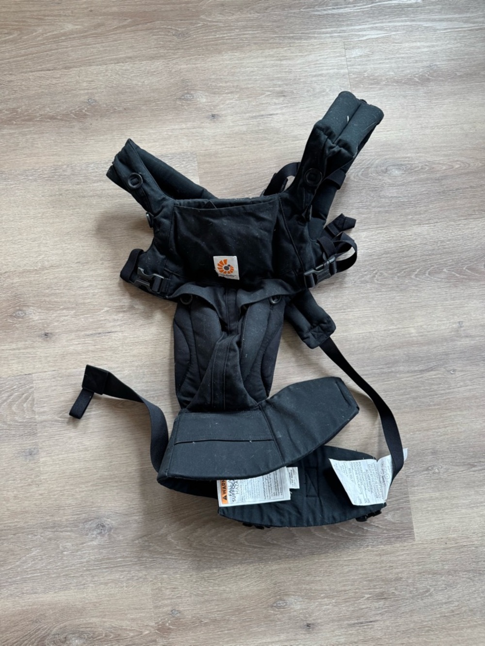 Ergobaby Black Carrier with Orange Logo Accent
